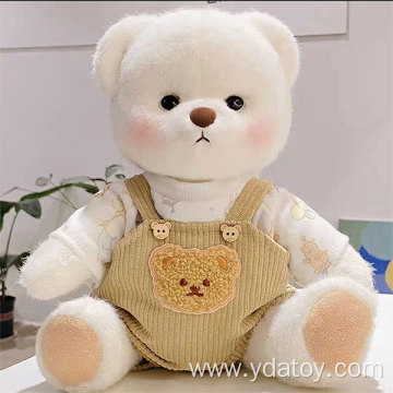 Plush white teddy bear doll